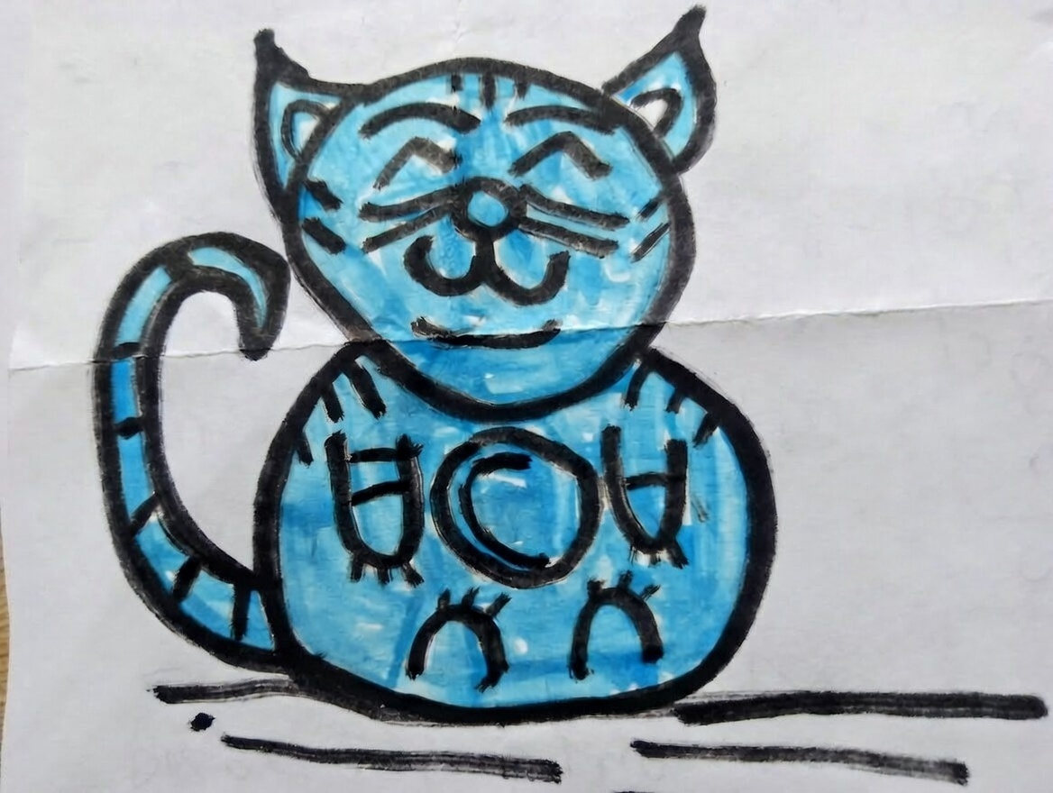 Zbliżenie na głowę żółtego kotka